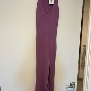 Long purple form-fitting dress with slit, size large